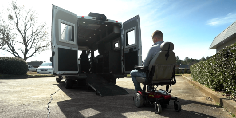 handicap person entering pathway rv on wheelchair ramp